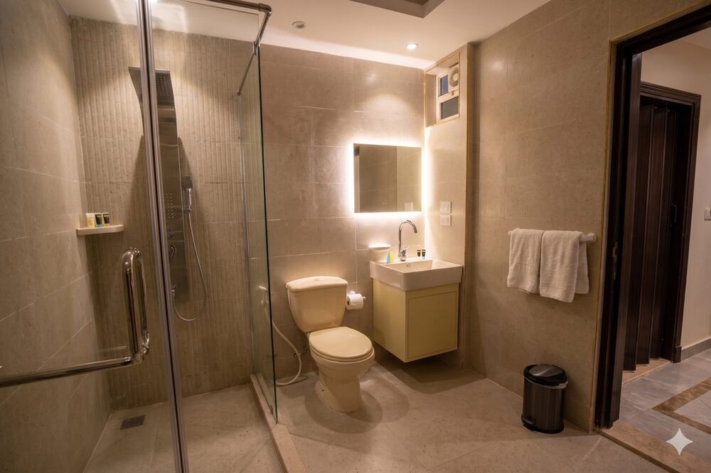 Modern bathroom with backlit mirror